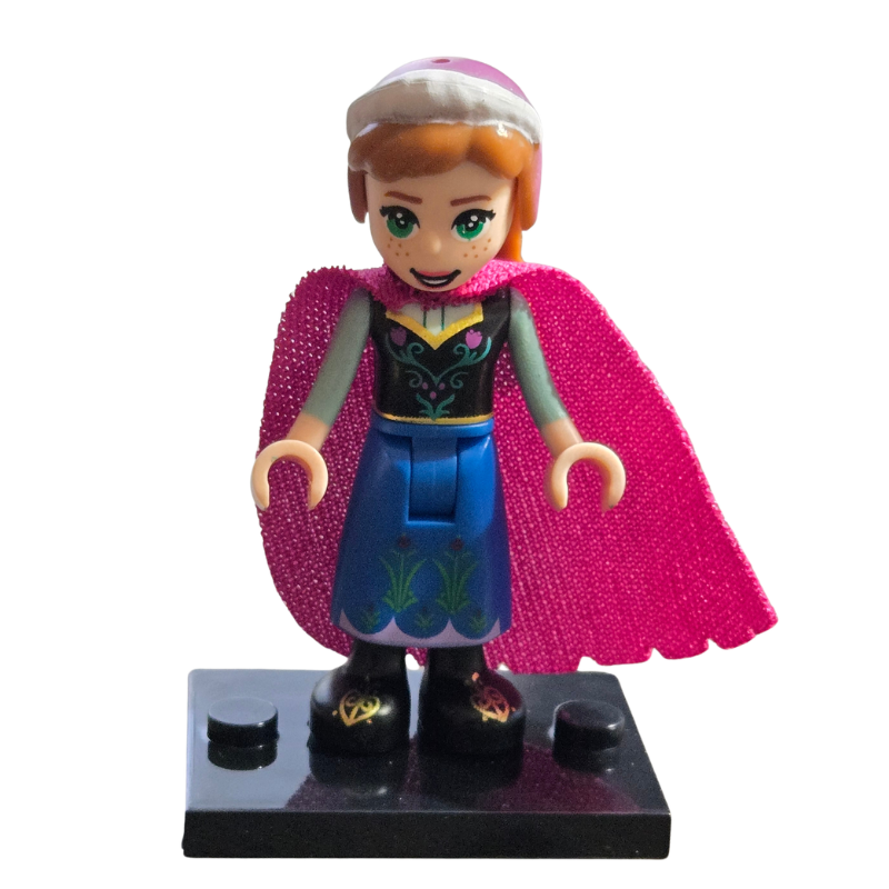 Toy figure with a pink cape on a white background