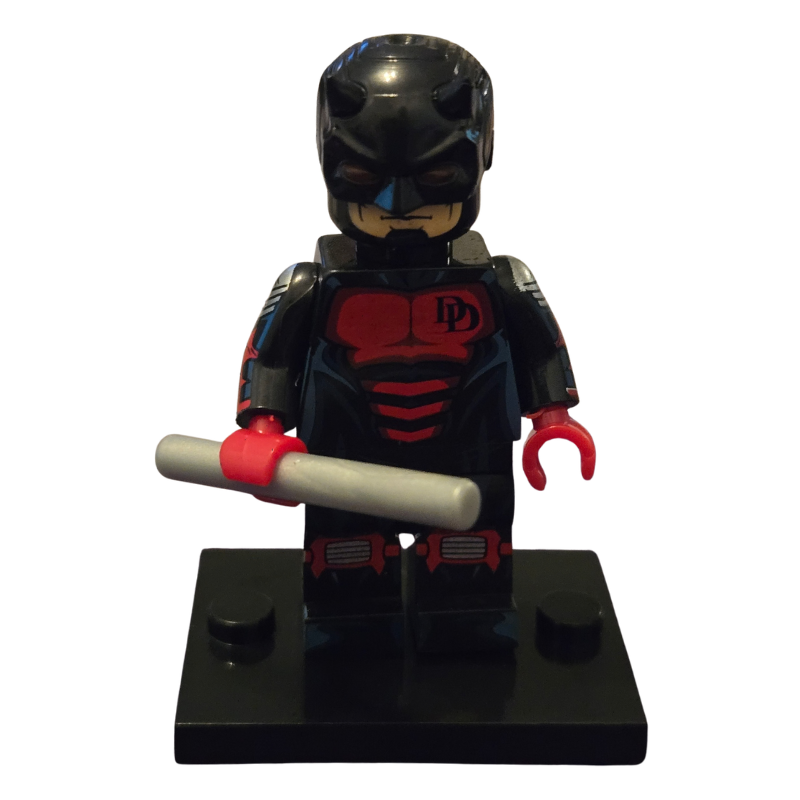 Black and red superhero figure with a helmet and weapon on a white background