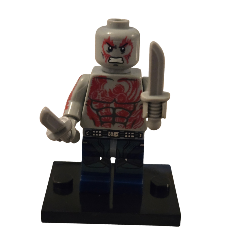 Toy figure with red and black design on a white background