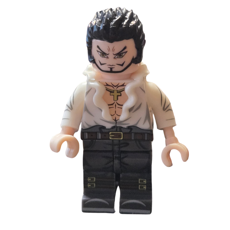 Toy figure with black hair and tattoos on a white background
