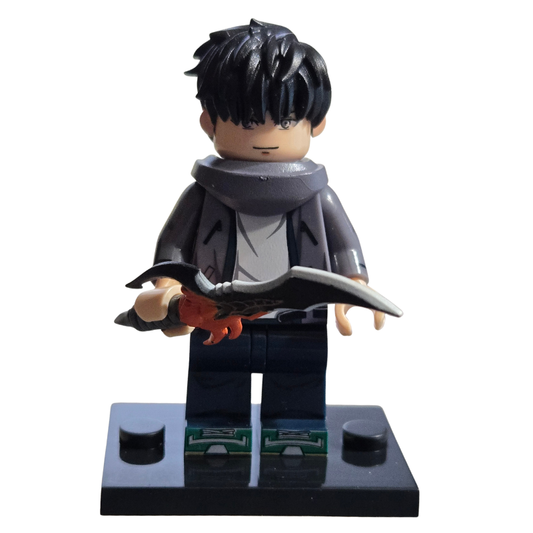 Toy figure holding a weapon on a white background