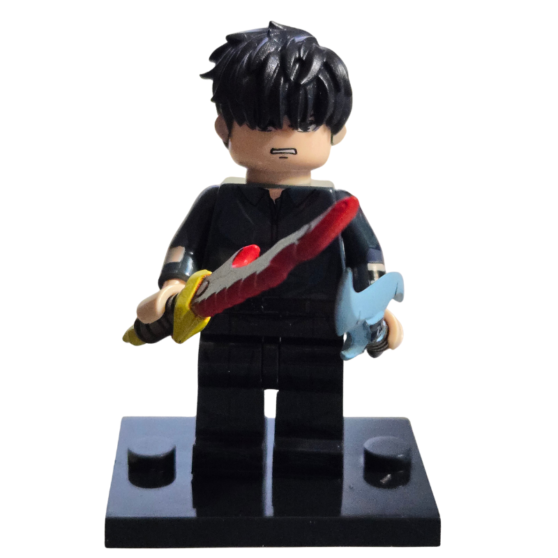Toy figure with black hair and black outfit holding a red weapon on a white background