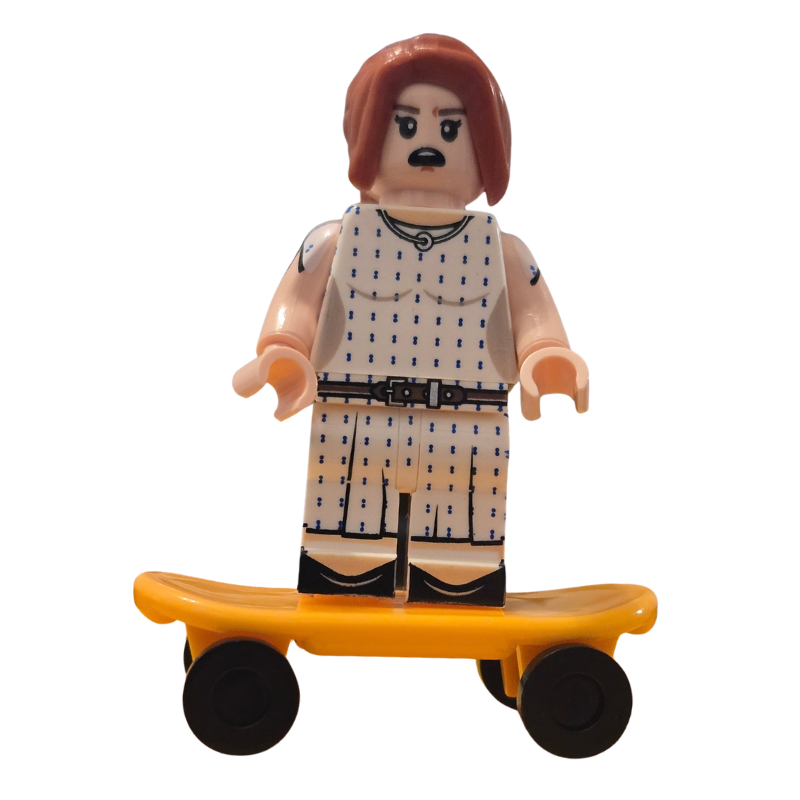 Toy figure on a skateboard with a white background