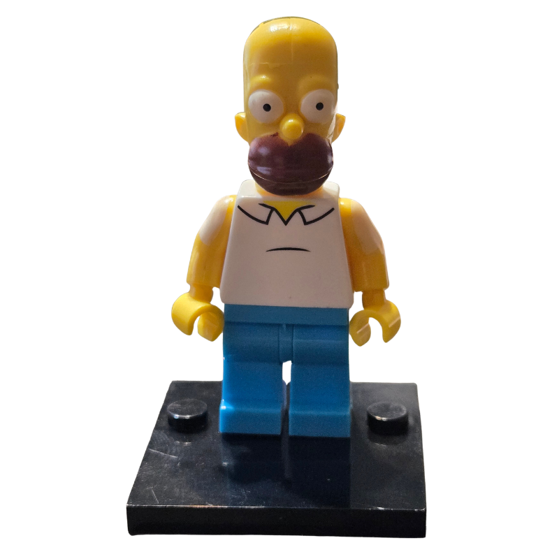 Toy figure of a character from 'The Simpsons' on a white background