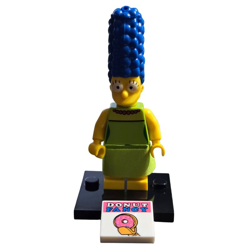 LEGO figure of a character with blue hair and green overalls on a white background