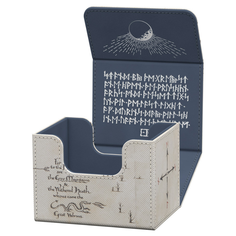 A Magic: The Gathering card box with an open lid, featuring a navy blue interior with white runic symbols and a cream-colored exterior with black script and illustration details.