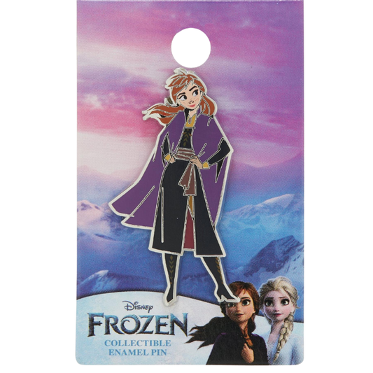 Disney Frozen collectible enamel pin on its original backing card, featuring Anna in a purple cloak against a mountain backdrop, with Elsa and Sven also pictured on the card.