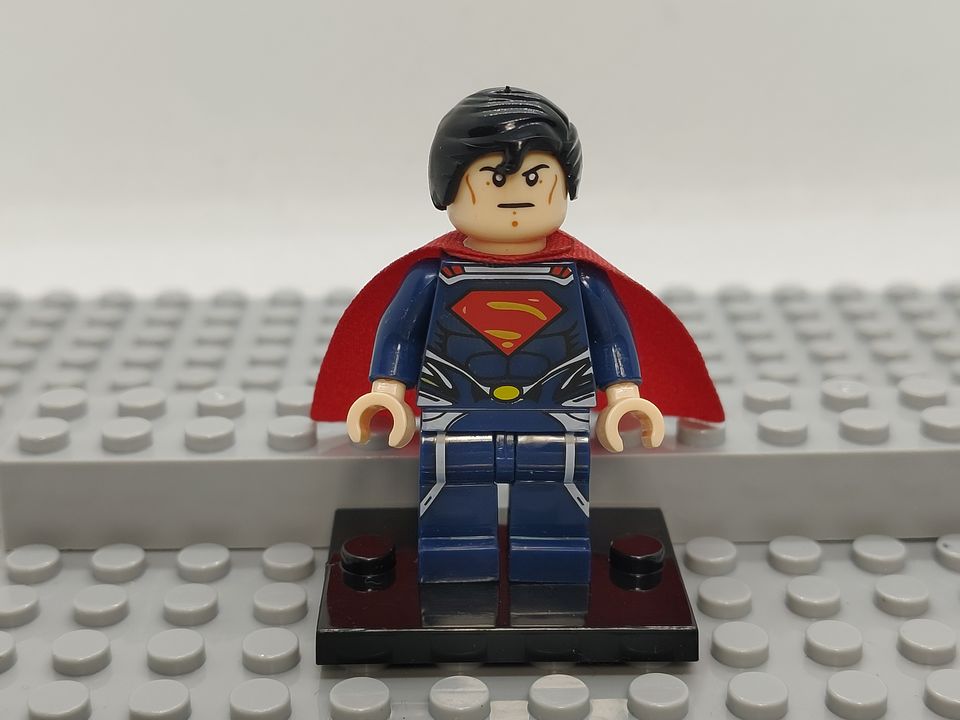Superman™ Badge Reel Made With LEGO® Minifigure™ Brown Skin
