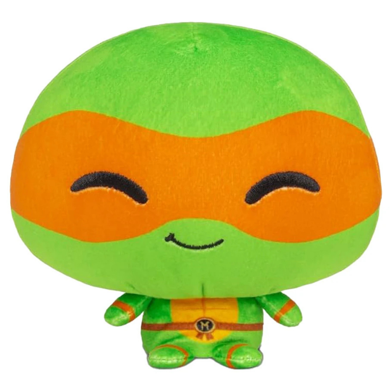 Plush toy resembling a character with green shell and orange mask on a white background