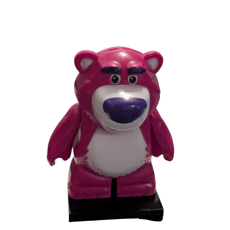 Pink cartoon character figurine on a white background