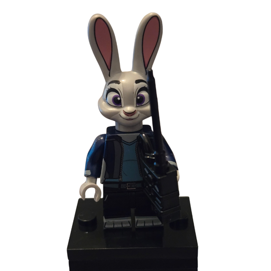 Toy figure of a character with large ears on a white background