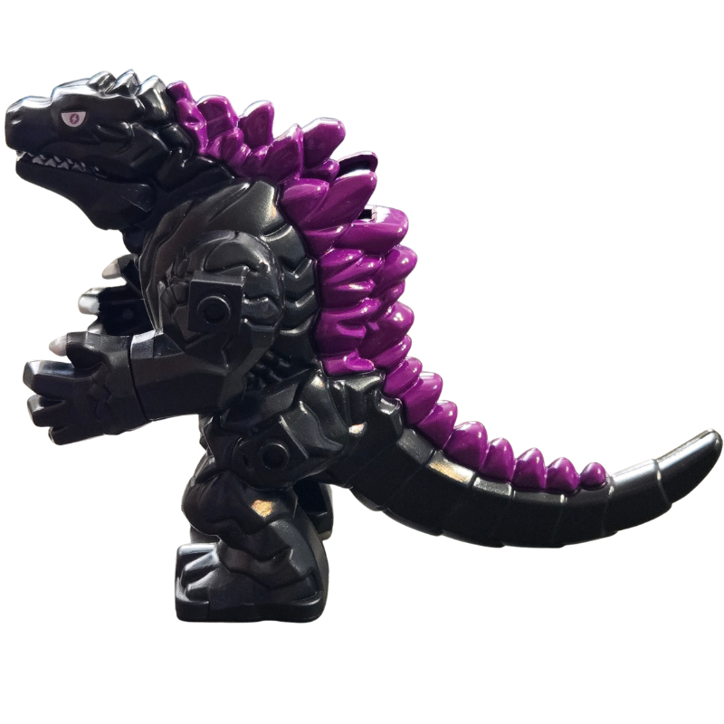 Toy figure of a creature with purple spikes on a white background