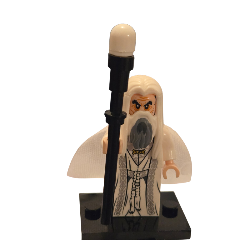 Minifigure of a character with white beard and robe holding a staff on a white background