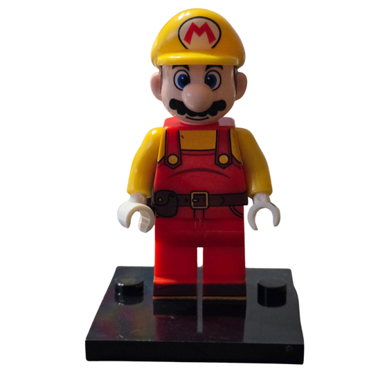 Super Mario figure with yellow hat and red overalls on a white background