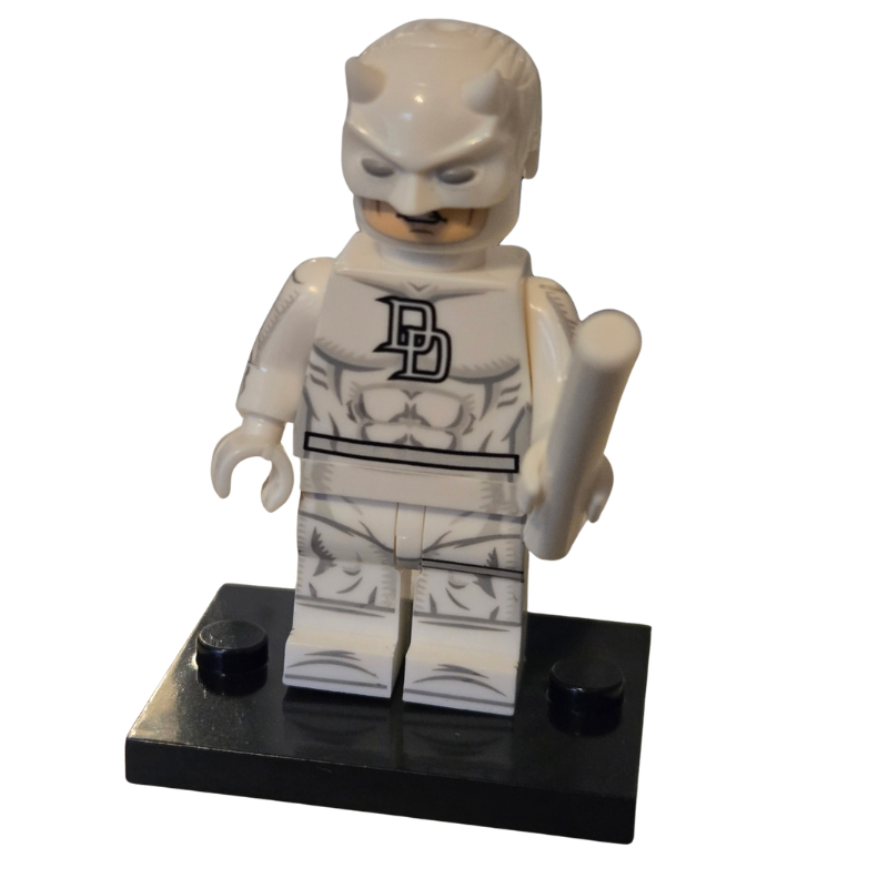 LEGO minifigure with a white outfit and black accents on a white background