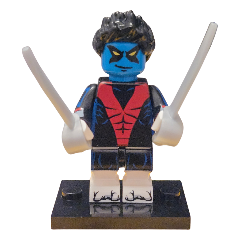 Toy figure with blue face, black hair, red and black outfit on a white background