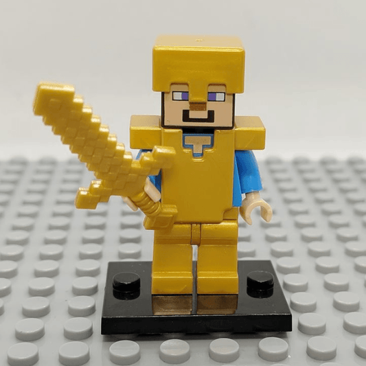 A custom Lego compatible minifig figure in Minecraft style, featuring a golden armor suit and holding a sword, standing on a black base.