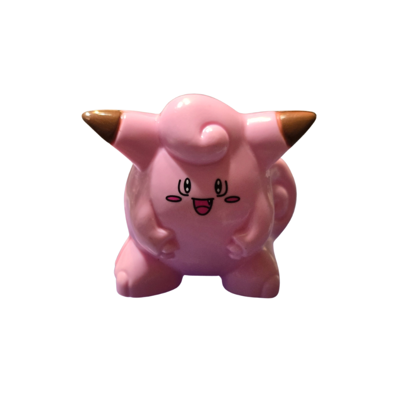Pink cartoon-like creature with gold horns on a white background