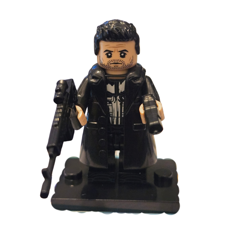 Black action figure with a helmet and weapon on a white background