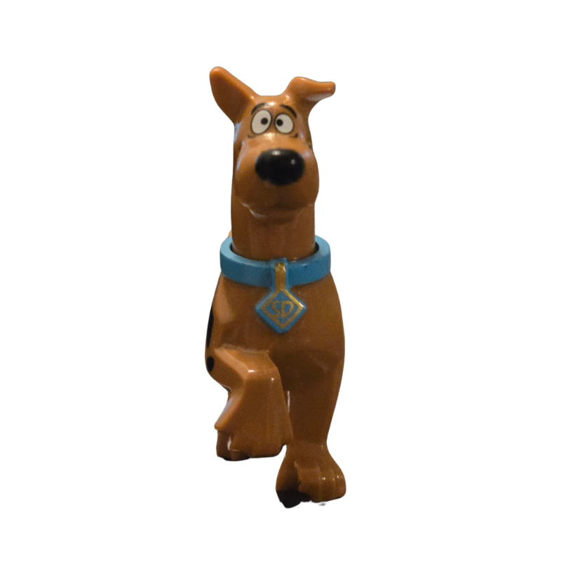 Toy figure of a brown dog with a blue collar on a white background
