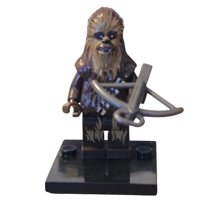 LEGO minifigure of a character with a bow on a white background