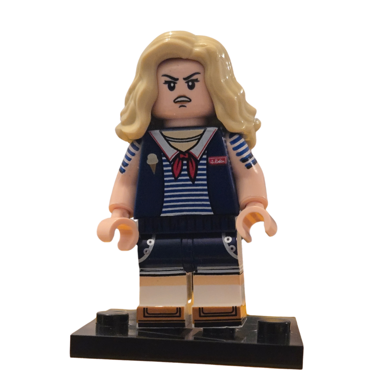 LEGO minifigure with blonde hair and a striped outfit on a white background