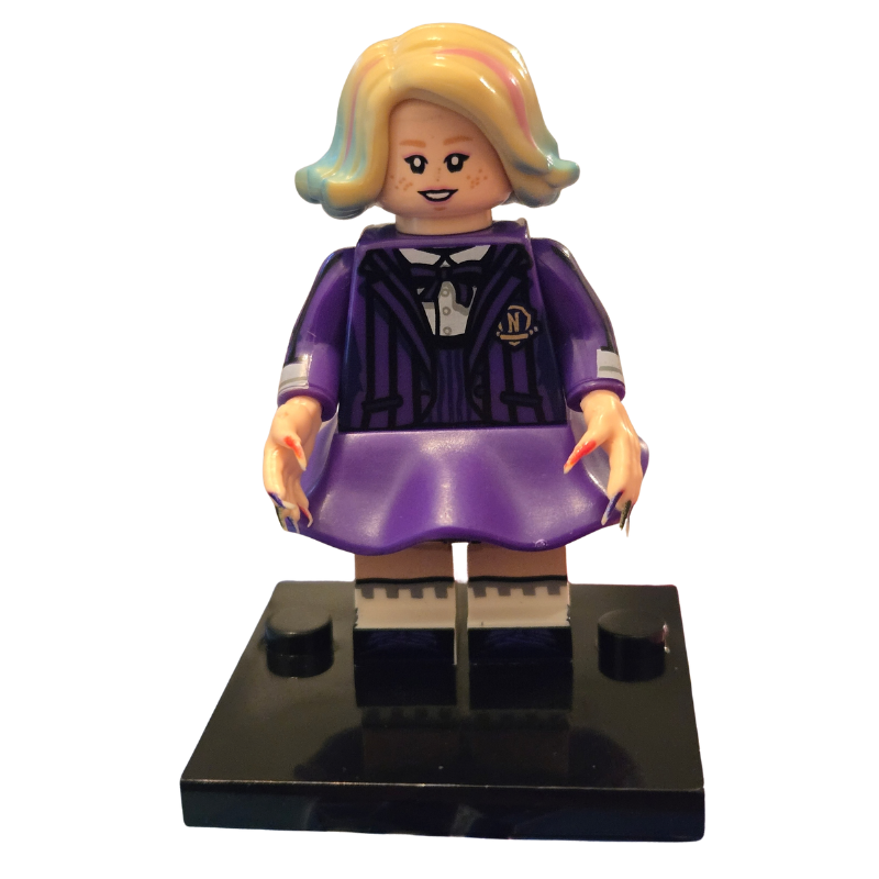 Toy figure with a purple outfit on a white background