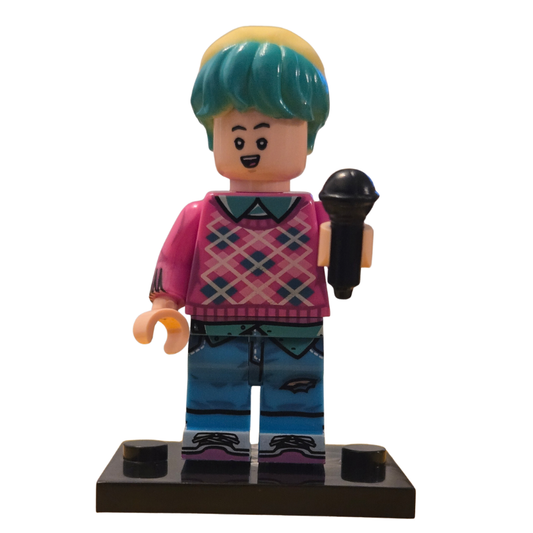 Toy figure with colorful hair and clothing on a white background