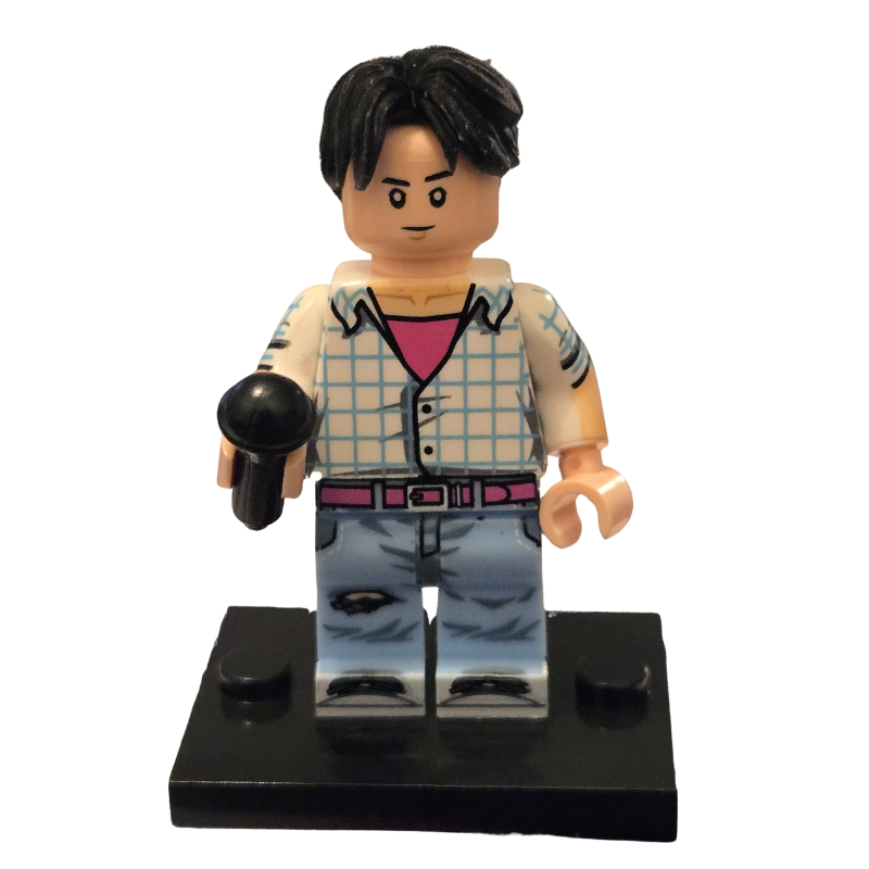 Toy figure with checkered shirt and jeans on a white background