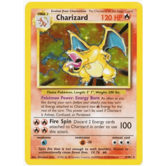 A vintage Pokémon Charizard trading card with a yellow border, featuring Charizard artwork in the center and game text on a red-orange background.