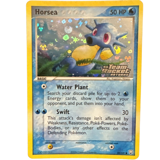 Horsea Pokémon trading card with Team Rocket logo